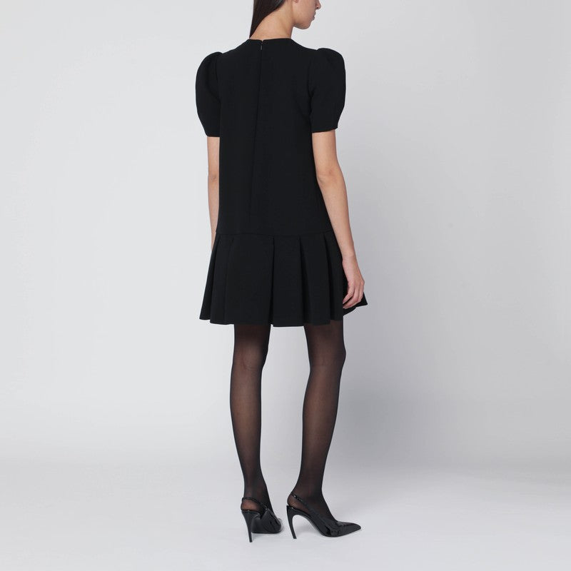 Black mini dress with pleats