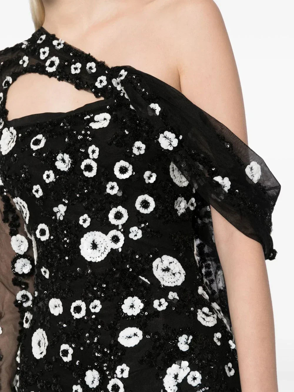 Tulle one-shoulder sleeve, dress with dotted beading a tulle tail