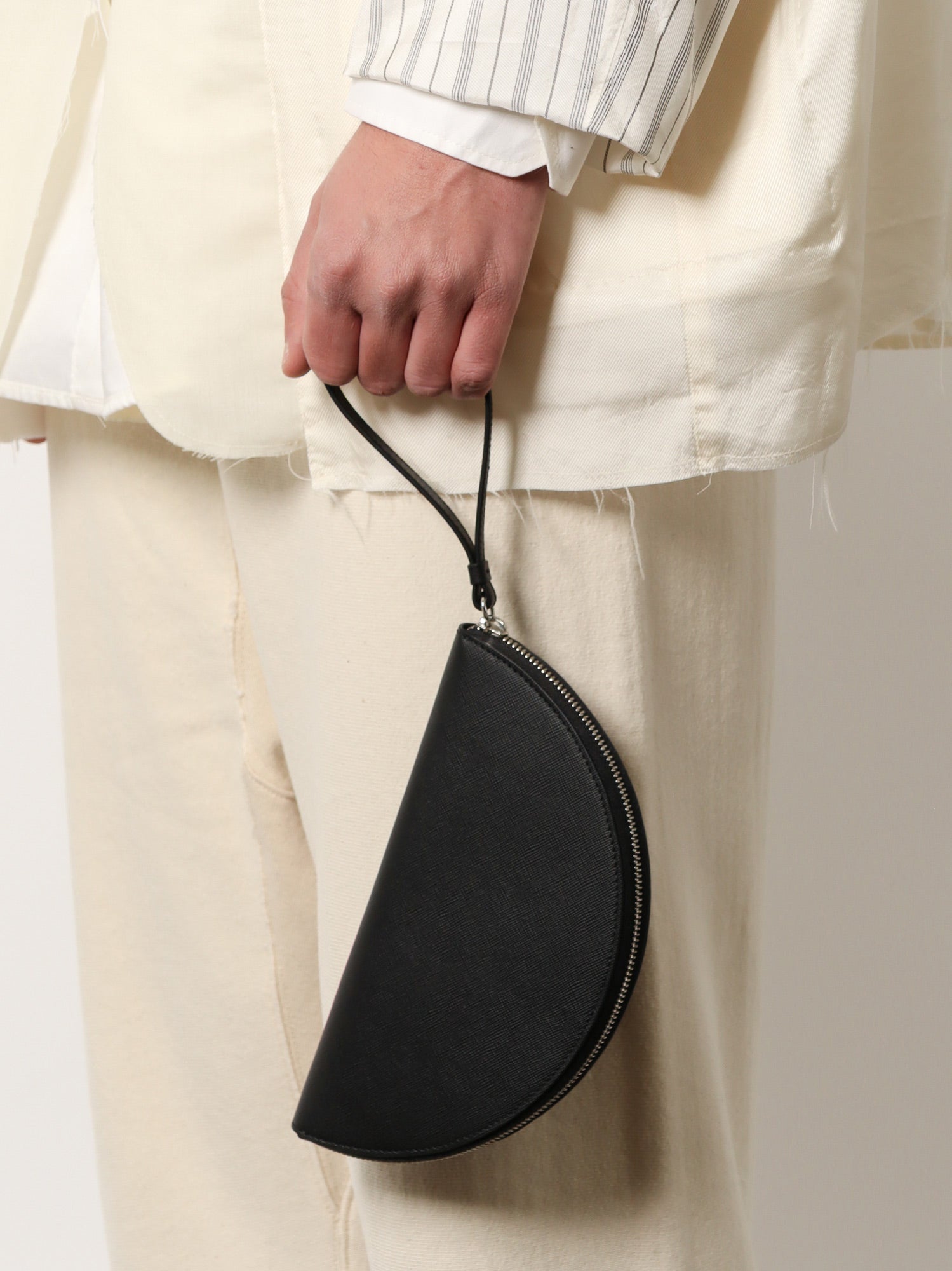 Leather pochette with iconic four stitched detail