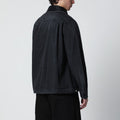 Black denim jacket with nylon inserts