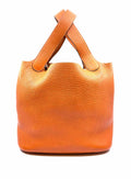 HERMES Orange Leather Pebble Handbag