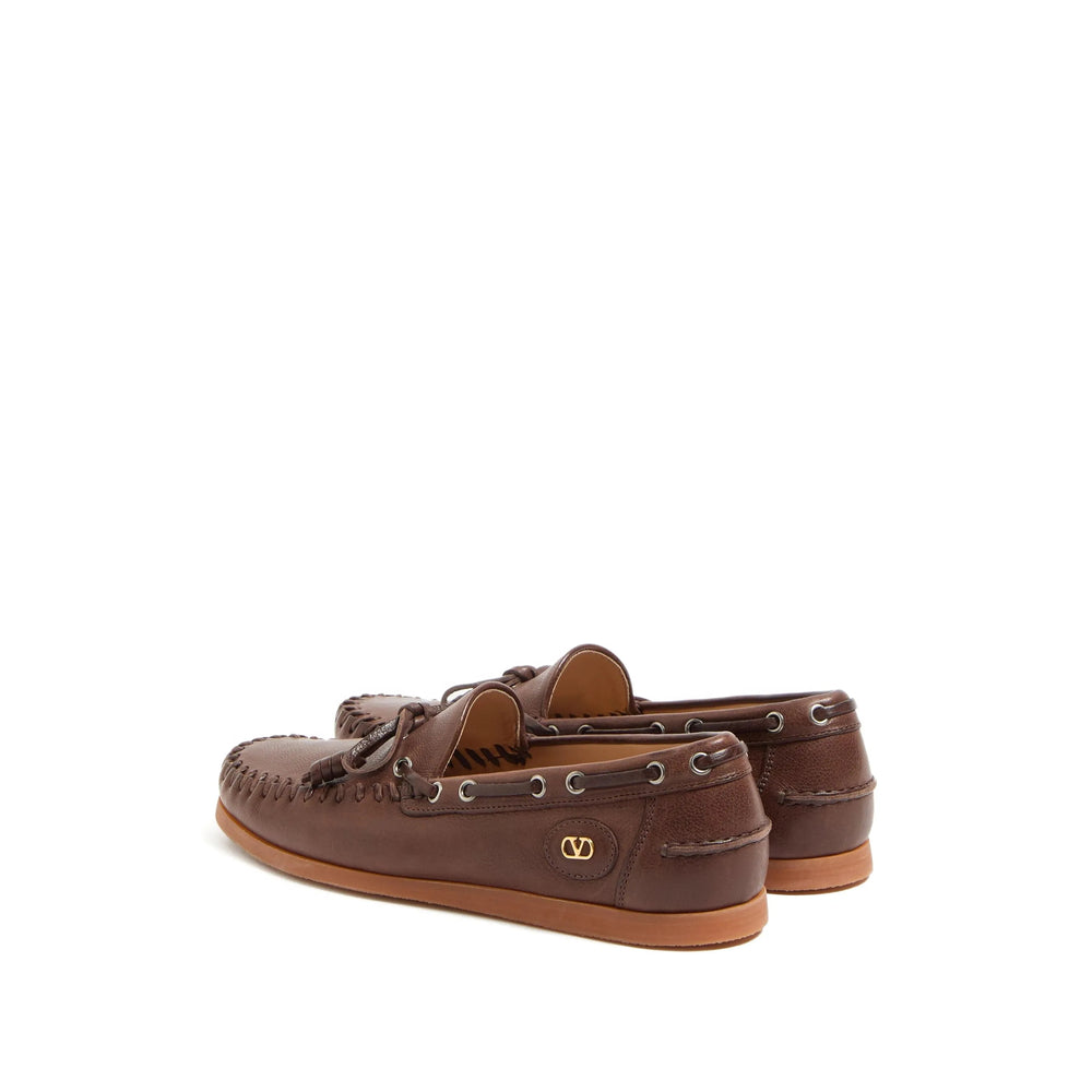 Bow Embellished Leather Slip-on