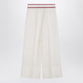 Ivory trousers with Gold V
