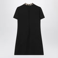 Black Crepe Couture dress with animal-print bow