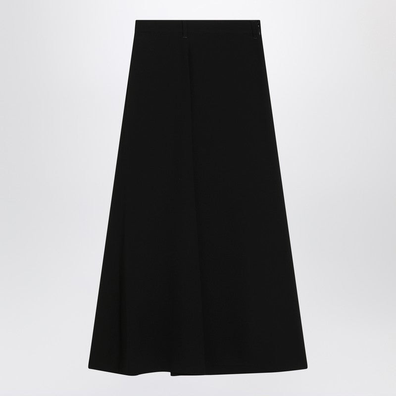 Draped black skirt in crêpe