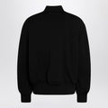 Black leather bomber jacket with wool sleeves
