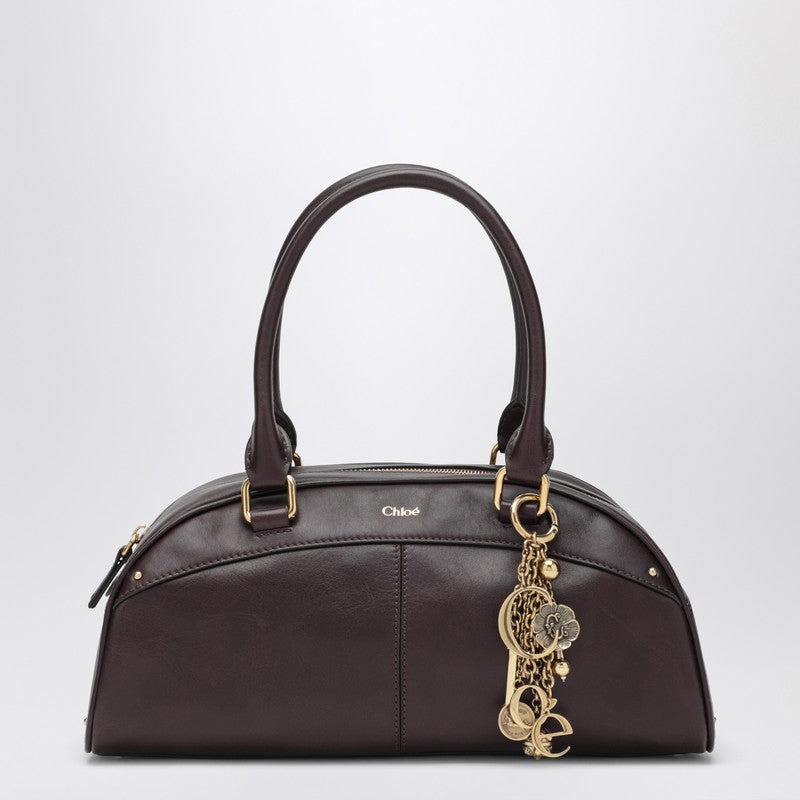Plum bowling bag
