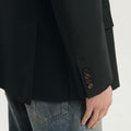 Dark green double-breasted blazer