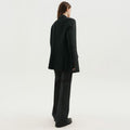 Dark green double-breasted blazer
