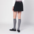 Black ruffled mini skirt in wool blend