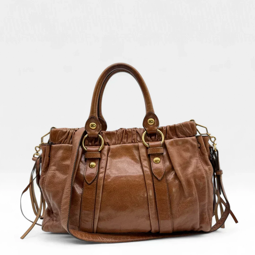 🔥 Pre-owned Miu Miu handbag Vitello Lux with shoulder strap made of dark brown leather 🔥