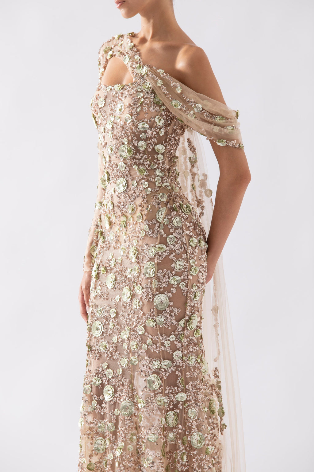 Tulle one-shoulder sleeve, dress with dotted beading a tulle tail