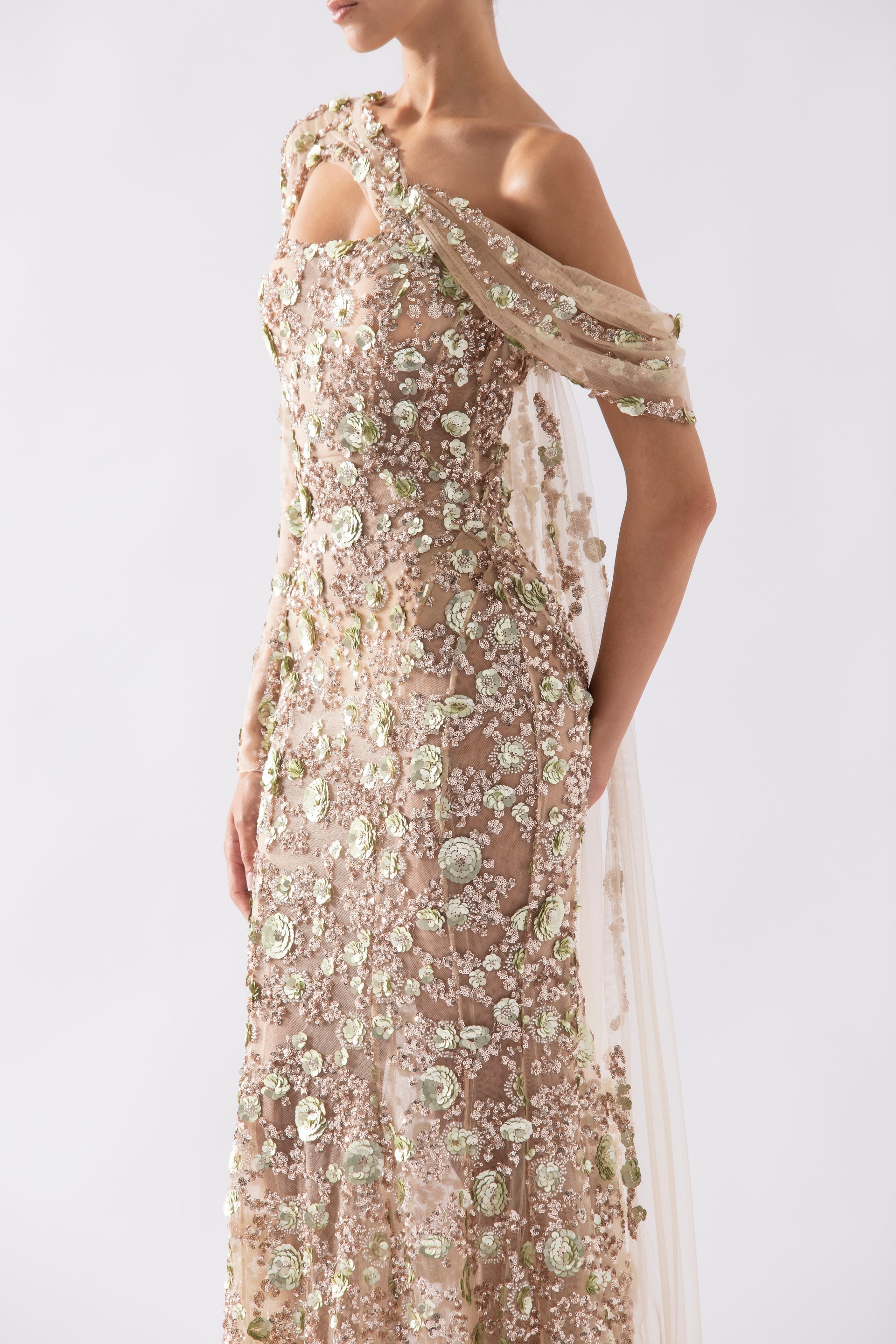 Tulle one-shoulder sleeve, dress with dotted beading a tulle tail