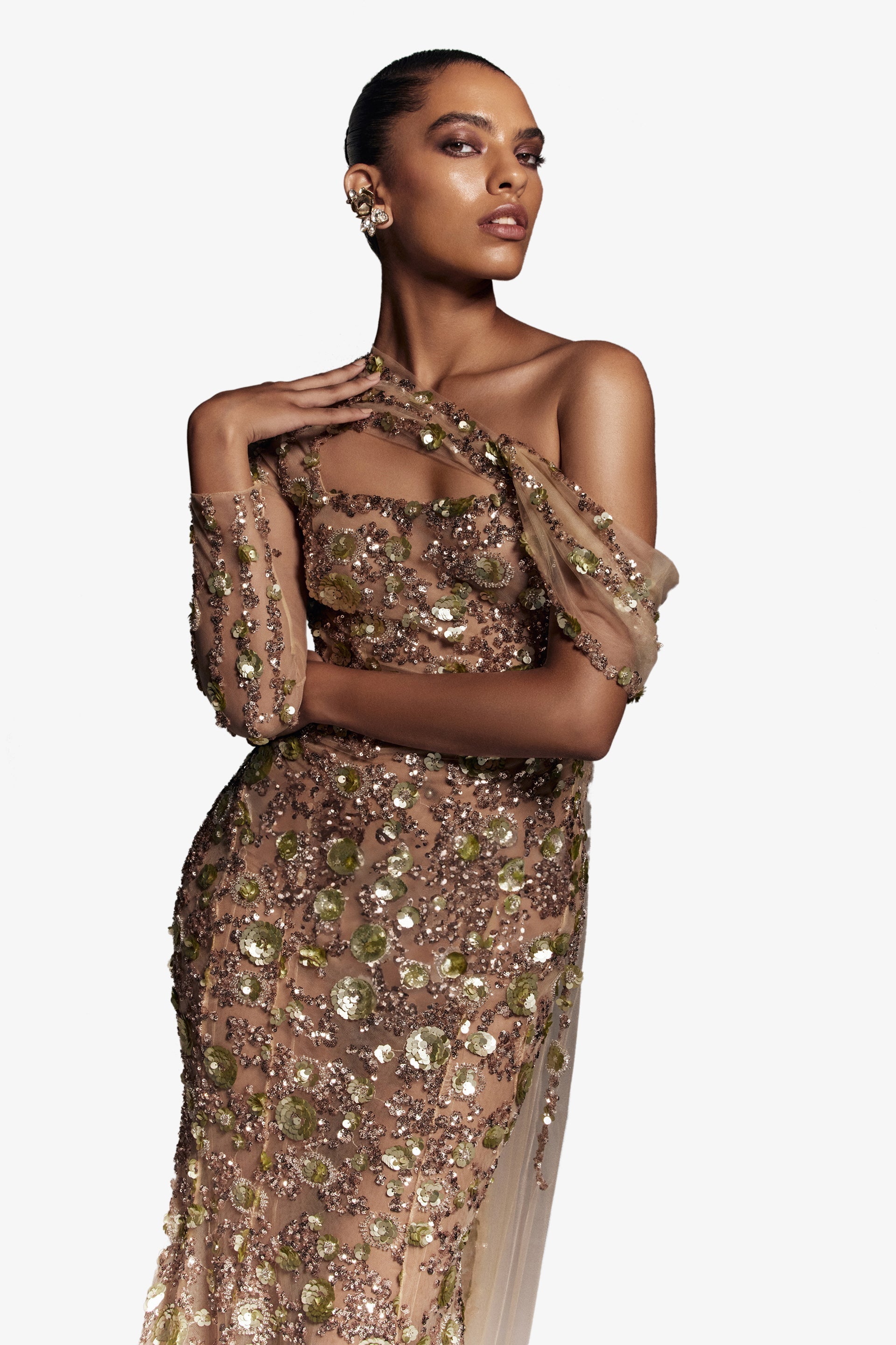 Tulle one-shoulder sleeve, dress with dotted beading a tulle tail