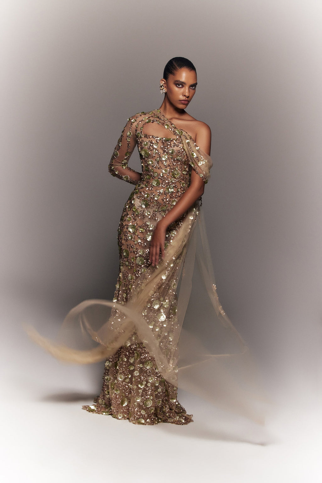 Tulle one-shoulder sleeve, dress with dotted beading a tulle tail