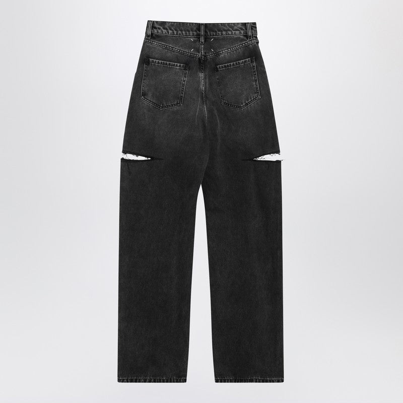 Washed black jeans with side rips