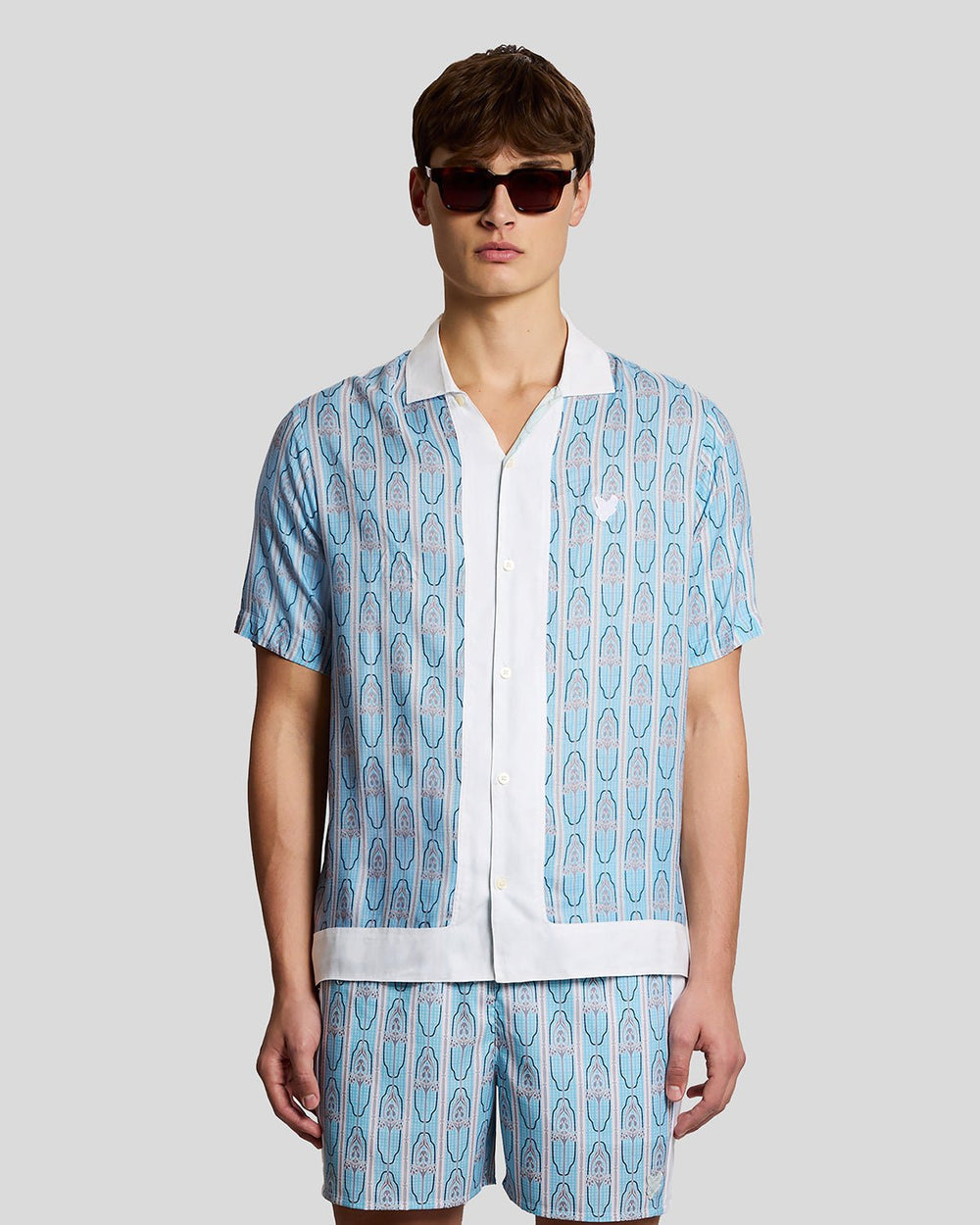 Lyle & Scott Mens Short Sleeve Floral Graphic Shirt | Almond Cream Parma Blue