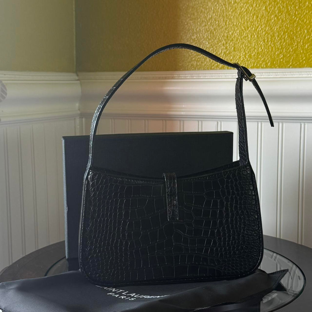 PreOwned Black crocodile leather bag with silver hardware