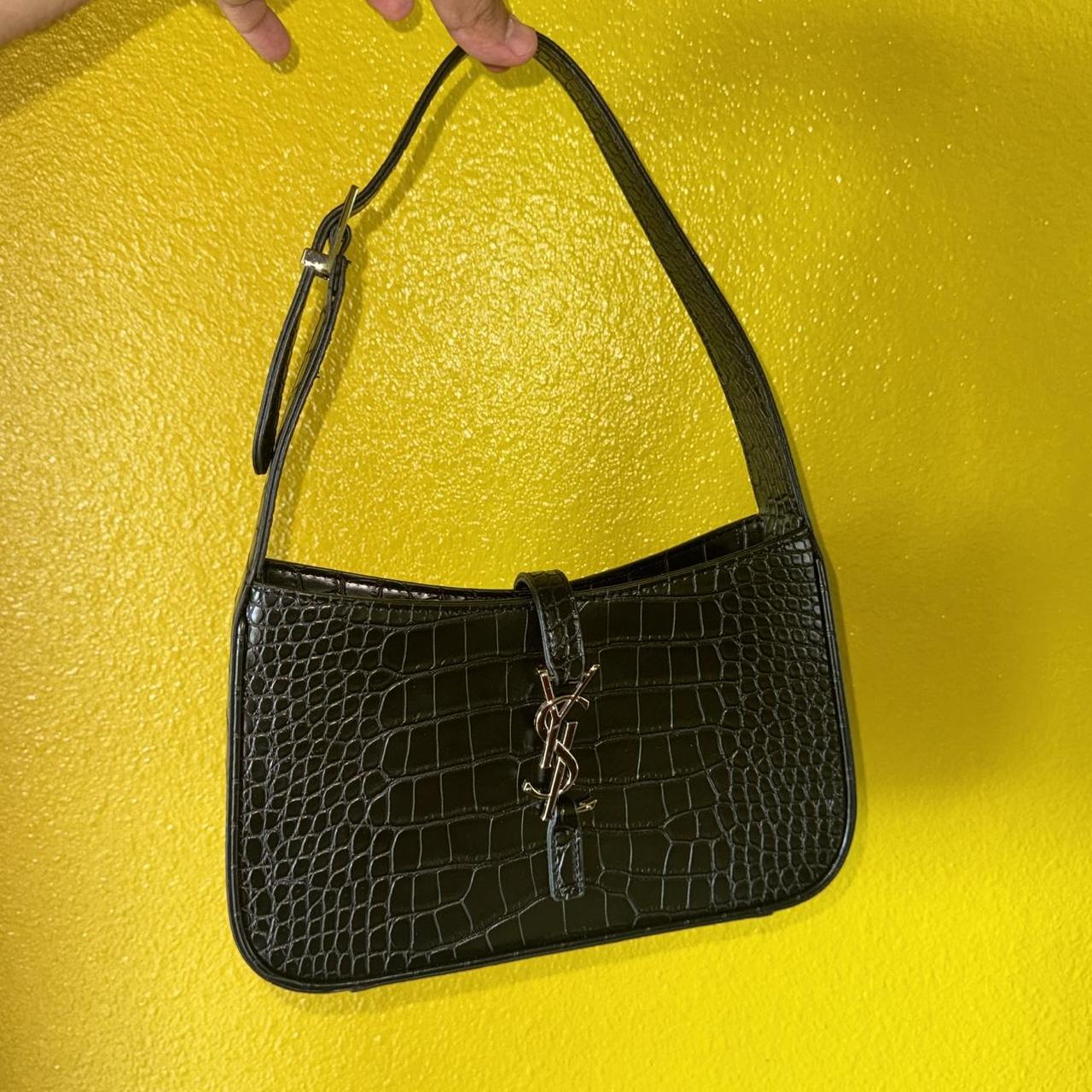 PreOwned Black crocodile leather bag with silver hardware