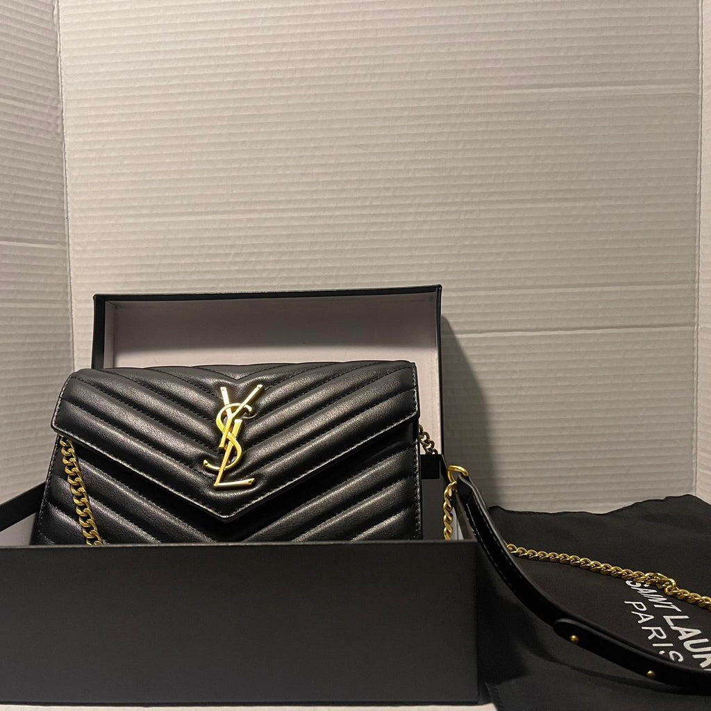 PreOwned Black and gold Saint Laurent Paris leather crossbody